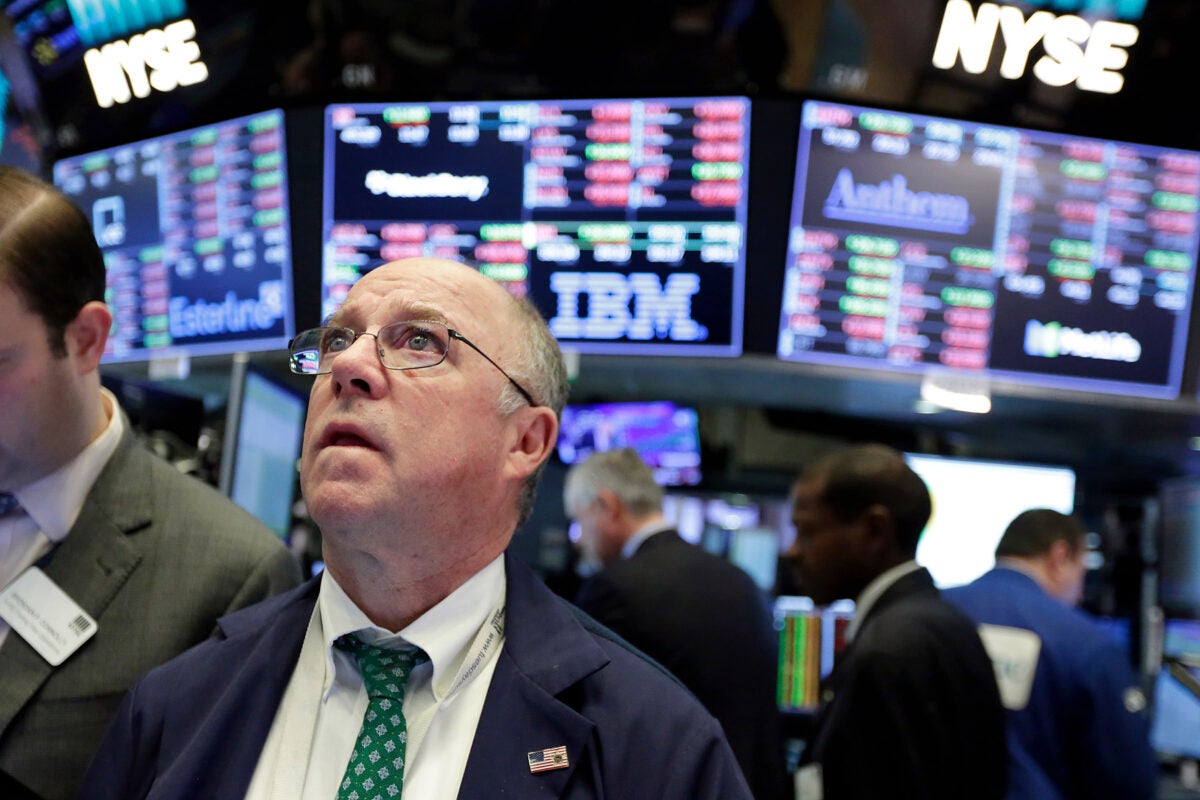 New York Stock Exchange Trader Frederick Reimer reacts as the Dow Jones industrial plunged on Monday.