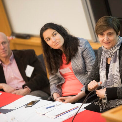 Christopher Ruhm (left), Maya Rossin-Slater, and Claudia Olivetti, take audience questions following their talk on parental leave in the developed world during a two-day conference on gender inequality.