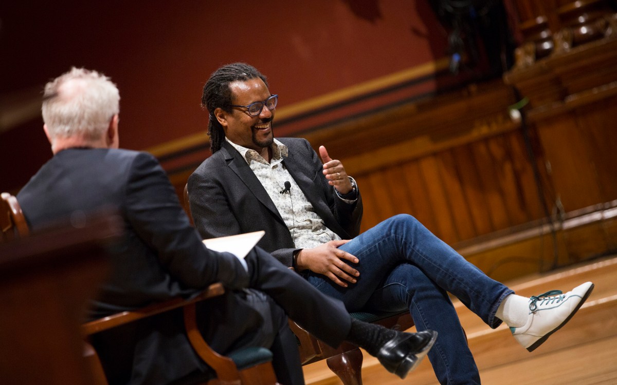 Colson Whitehead laughs with John Lithgow