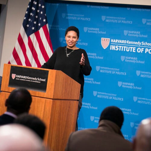 Moderator Peniel E. Joseph (left) looks on as Danielle Allen delivers the keynote address during the Hutchins Center symposium on Martin Luther King Jr., in which she lauded the many seemingly small steps towards justice and equality. 