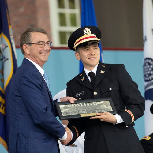 Belfer Center director Ash Carter congratulates Nathan Williams '18 during the ROTC Commissioning Ceremony during 367th Harvard Commencement. 