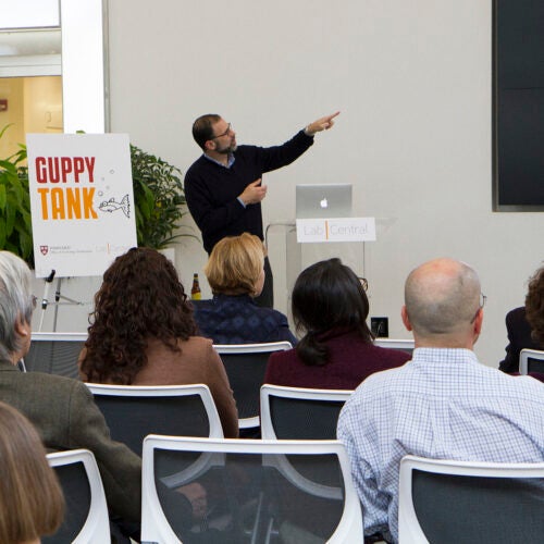 James R. Mitchell, associate professor of genetics and complex diseases at HSPH, presents on dietary restriction at Guppy Tank, where faculty get strategic guidance from a rotating panel of industry experts. 