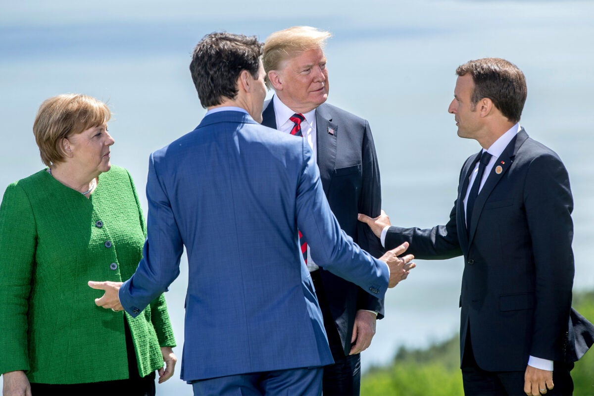 Angela Merkel, Justin Trudeau, Donald Trump, and Emmanuel Macron at the G7 summit.