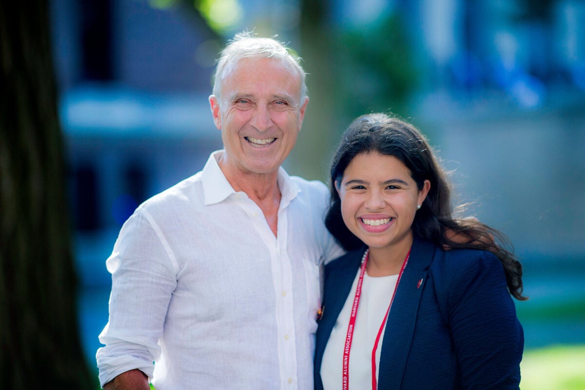 Peter Mazareas ’73 and Gabriela Ruiz-Colón ’16 were among a group of alumni volunteers who returned to campus on Monday to marshal First-Year Convocation.