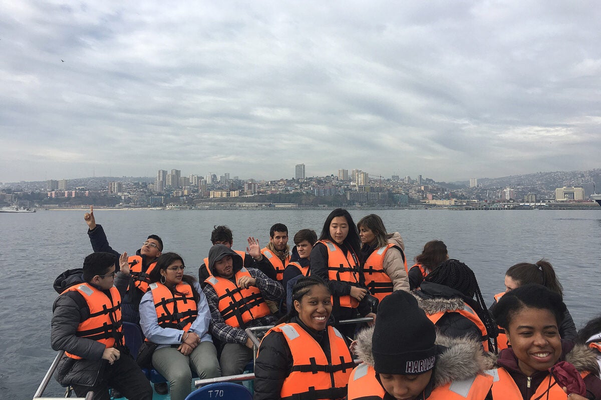 Off the coast of Valparaiso, Chile, Harvard faculty led by preceptor Adriana Gutiérrez (photographer) take a break from their exploratory visit to the University of Chile in Santiago.