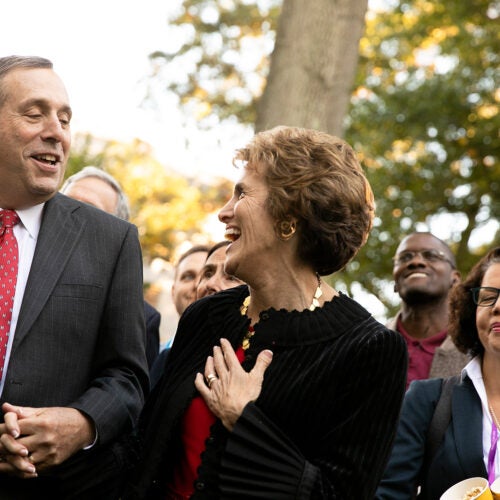Larry Bacow dances with wife, Adele, after his inauguration as Harvard's 29th president.