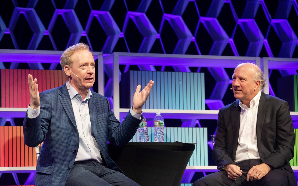 Harvard Business Review Editor-in-Chief, Adi Ignatius talks with Brad Smith (left), President and Chief Legal Officer, Microsoft