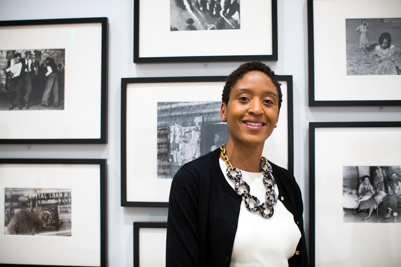 Makeda Best stands with 'Time is Now' exhibit at Harvard Art Museums.