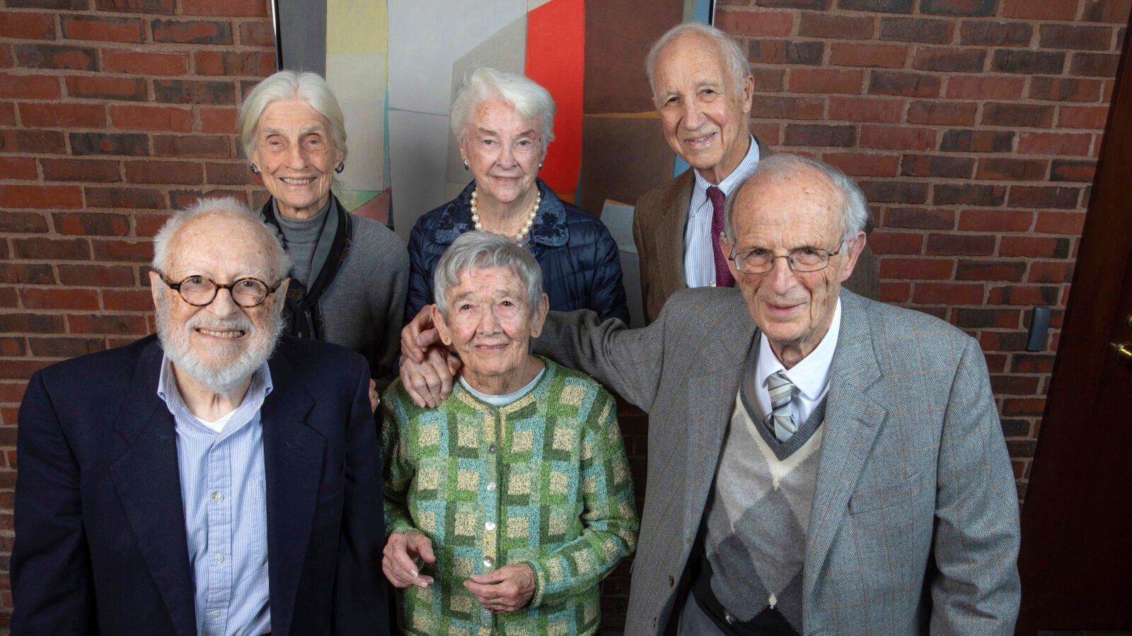 Six members of the Class of 1948 pose for a group photo. Front row (from left): Steven Stadler, Natalie Basso Ryan, Ray Goldberg. Back row: Sayre Phillips Sheldon, Eleanor “Buster” Foley Glimp, and Henry Lee. 