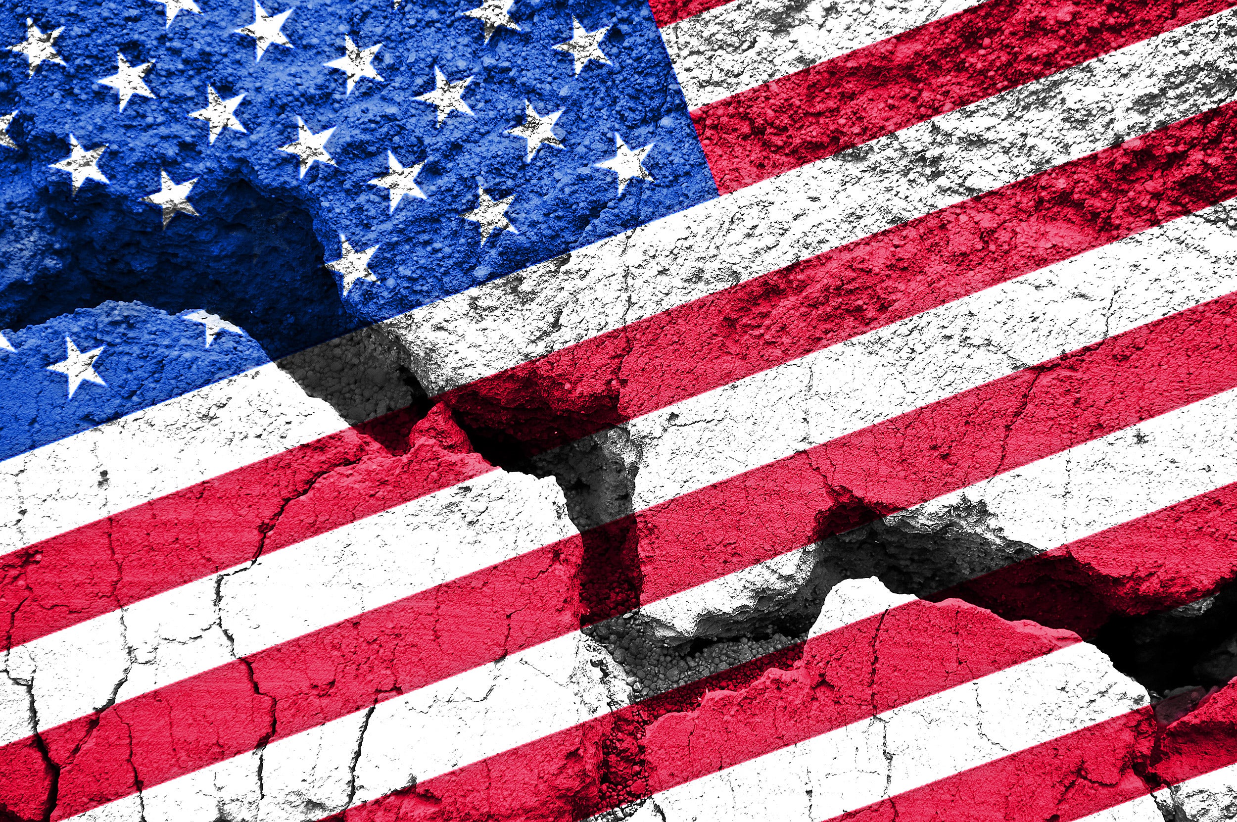U.S. flag on cracked background.