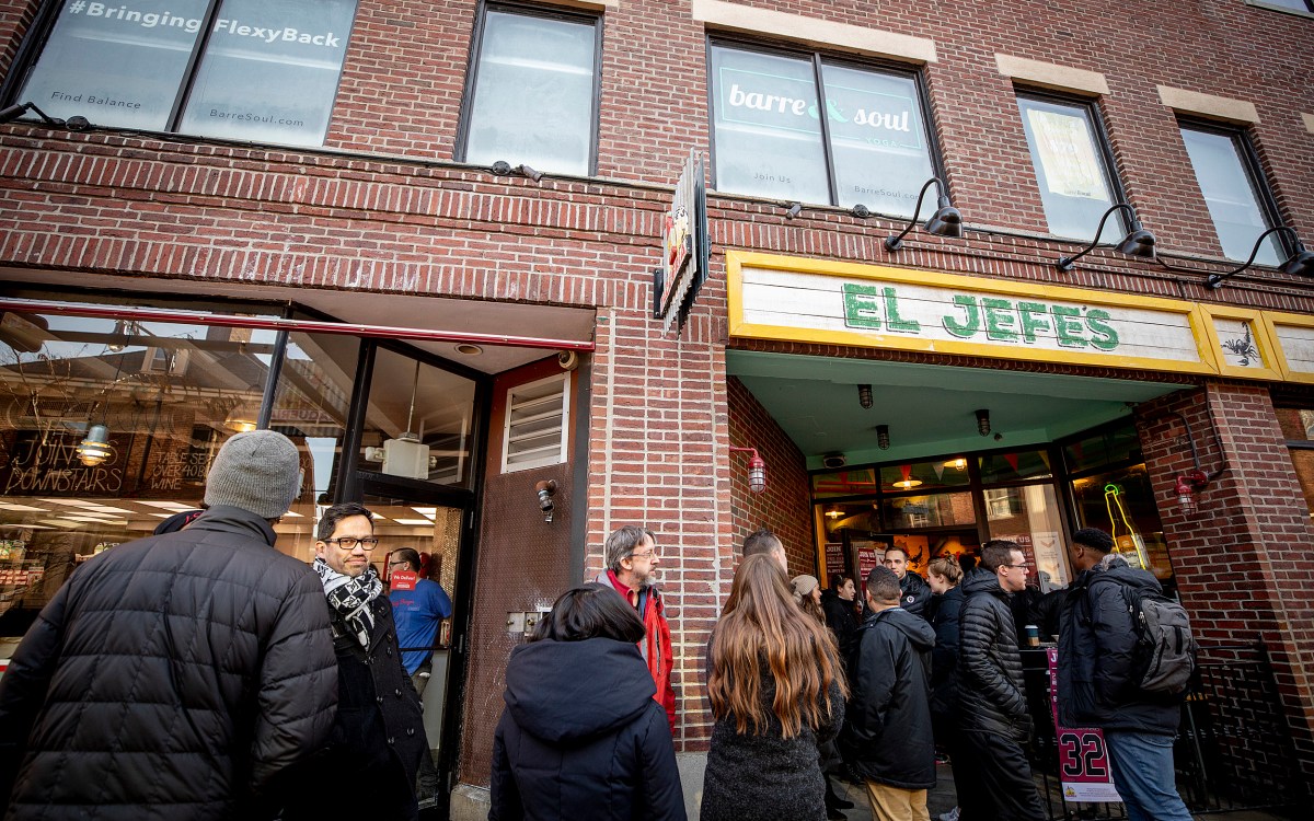 People in line in front of a Mexican restaurant