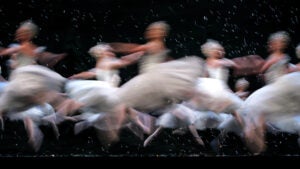 Ballerinas dance as snowflakes in "Nutcracker Ballet."