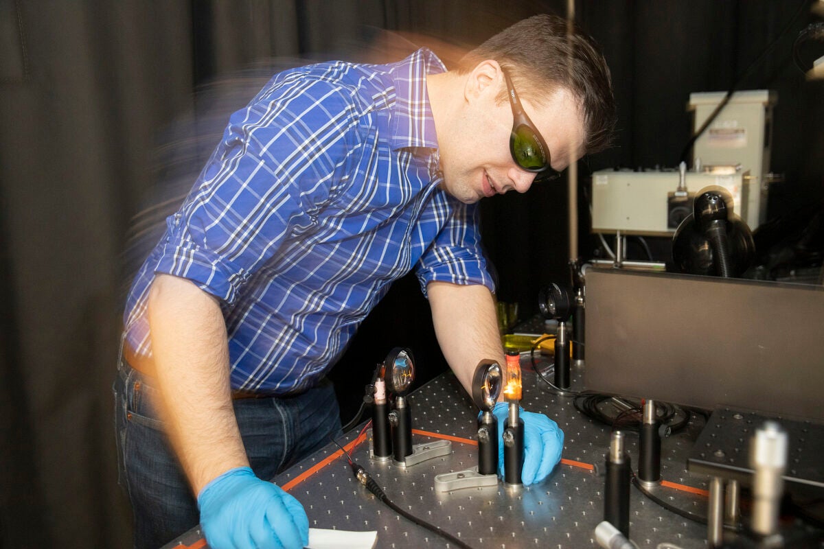 Dan Congreve works in his lab at the Rowland Institute.