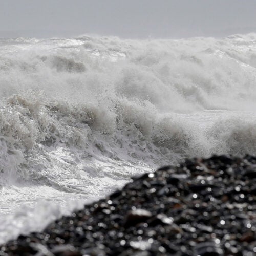 Heavy seas come ashore in Massachusetts.