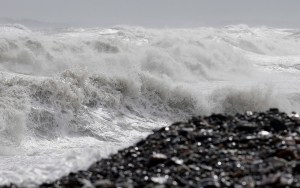 Heavy seas come ashore in Massachusetts.
