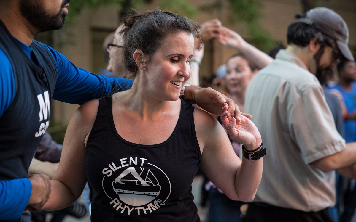 Kerry Thompson dances at Salsa in the Park.