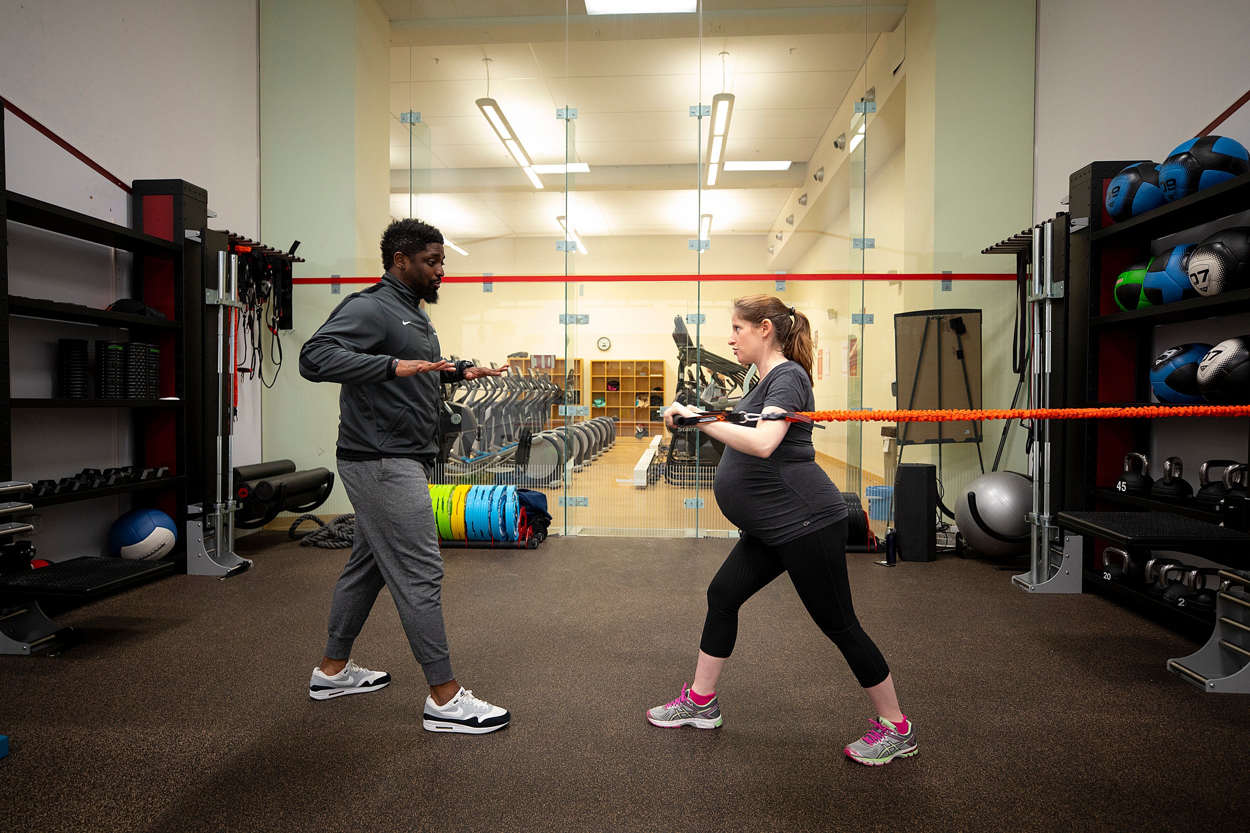 Talia Gillis works out at Hemenway gym with personal trainer Joel Waithe.