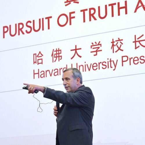 Harvard President Larry Bacow speaking at Peking University.