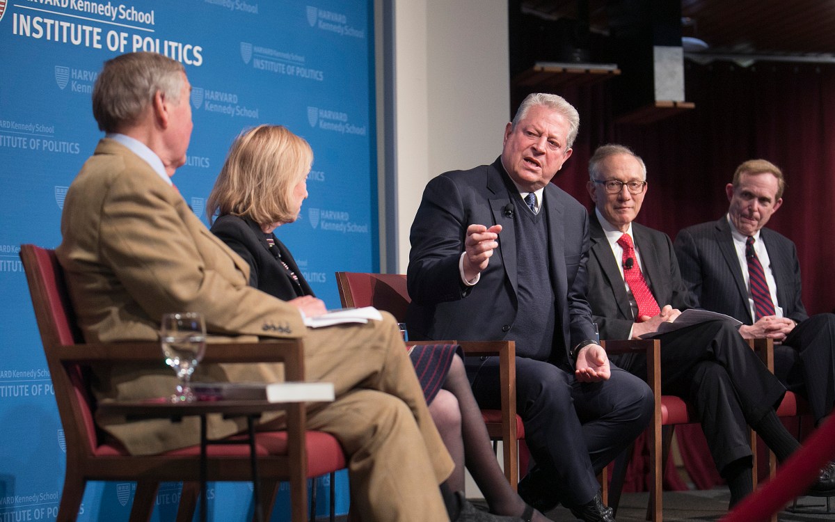 Al Gore (l to r), former Harvard Provost Harvey Fineberg, and Roger Porter, current HKS Professor of Business and Government, share a laugh during a discussion on the presidency in the 21st century. J