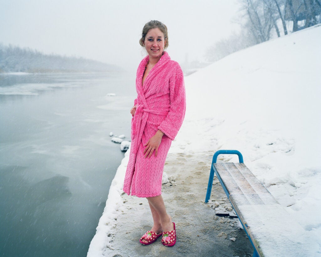 A young woman poses before entering the icy water in Astrakhan, Russia.