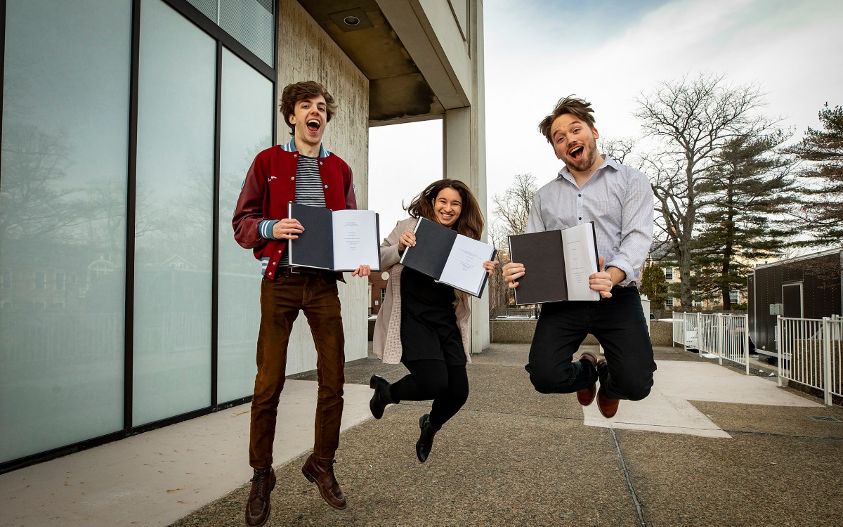 David Shayne, from left, Juliana Rodriguez, and Trevor Levin, senior concentrators in Social Studies handed in their thesis on "Thesis Day."