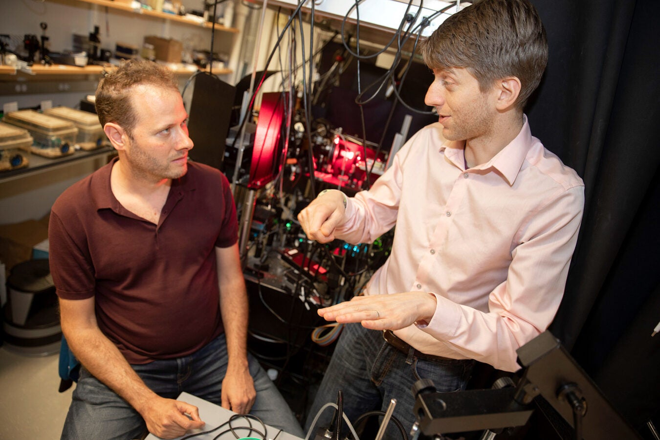Adam Cohen and Yoav Adam discuss their findings in Mallinckrodt Lab.