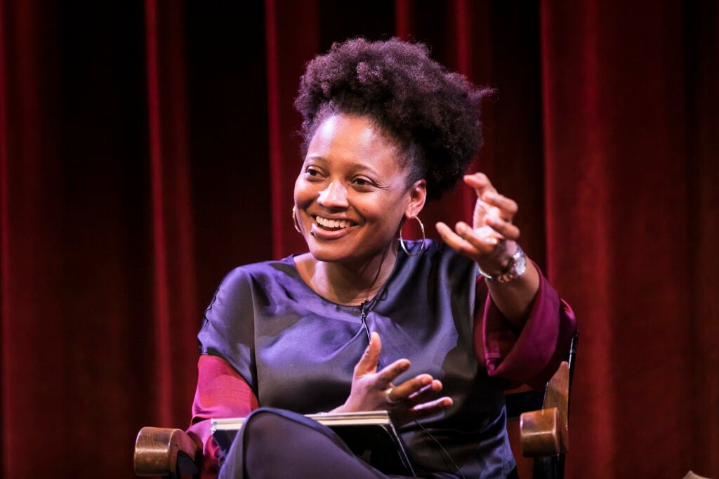 Tracy K. Smith seated on stage.