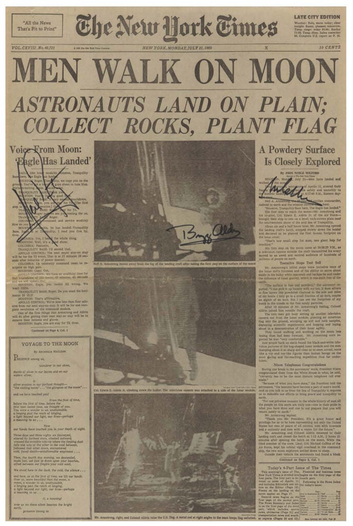 New York Times front page announcing moon landing with lead headline: MEN WALK ON MOON.