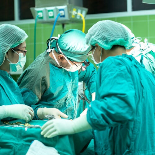 Surgeons performing an operation