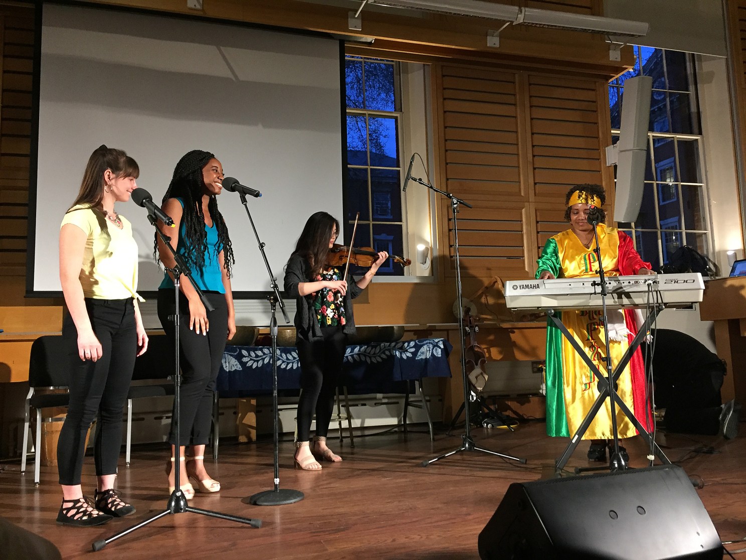 Students performing with Bethlehem Melaku