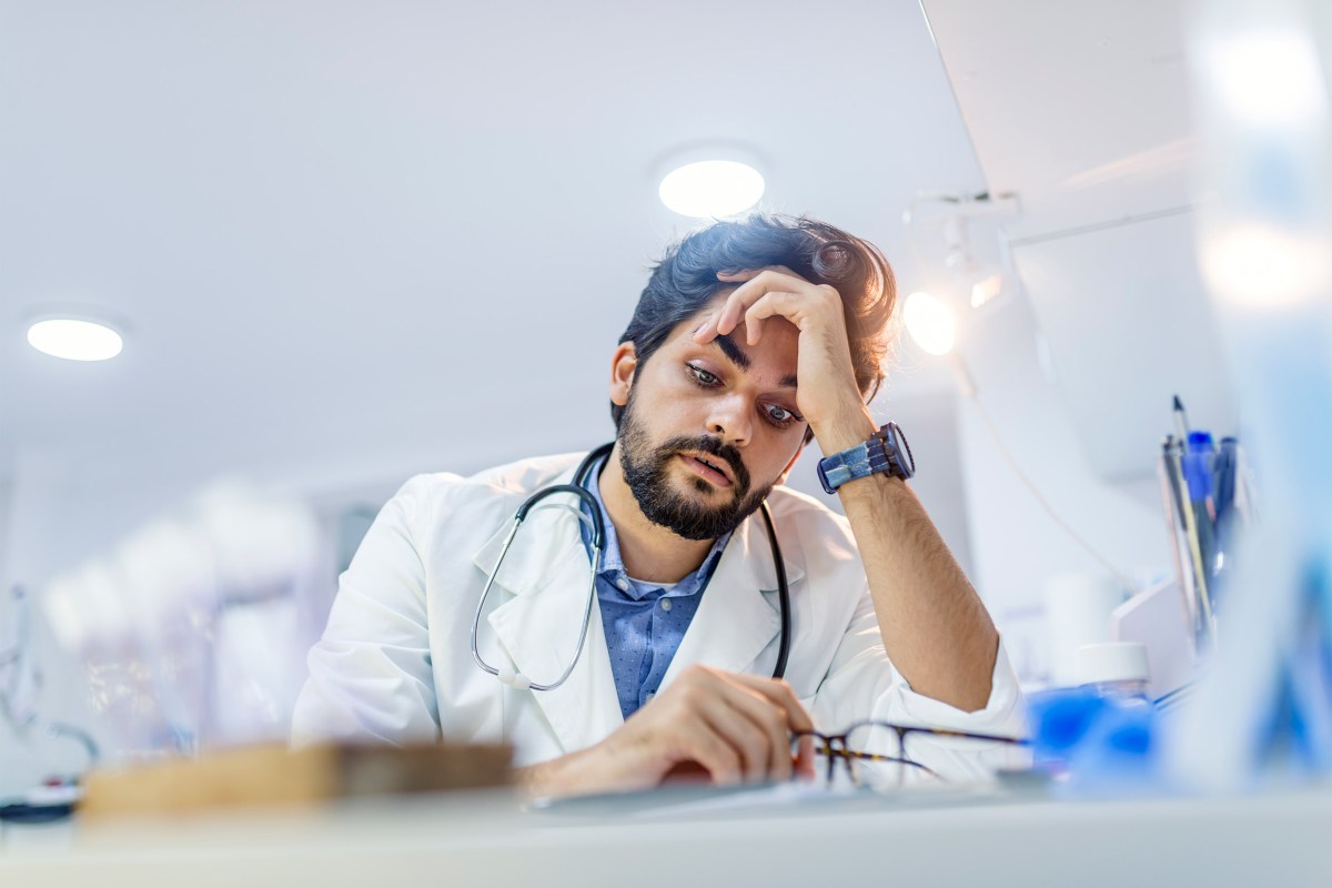 Stressed male doctor