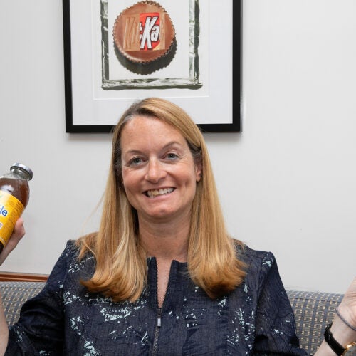 Jill Avery holds a toy car and a bottle of Snapple.