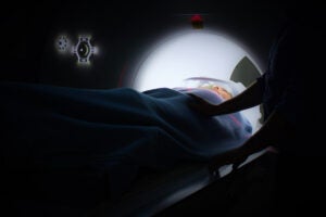 Person lying in a CT scanner