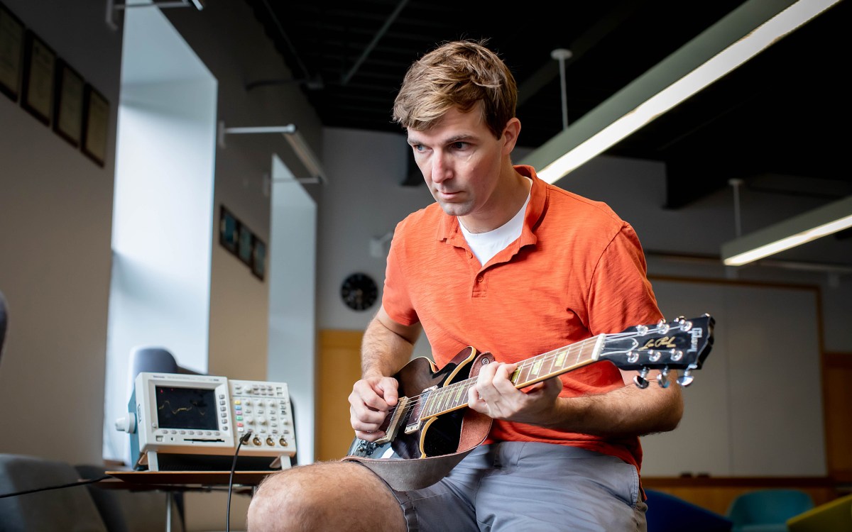 Robert Wood playing guitar