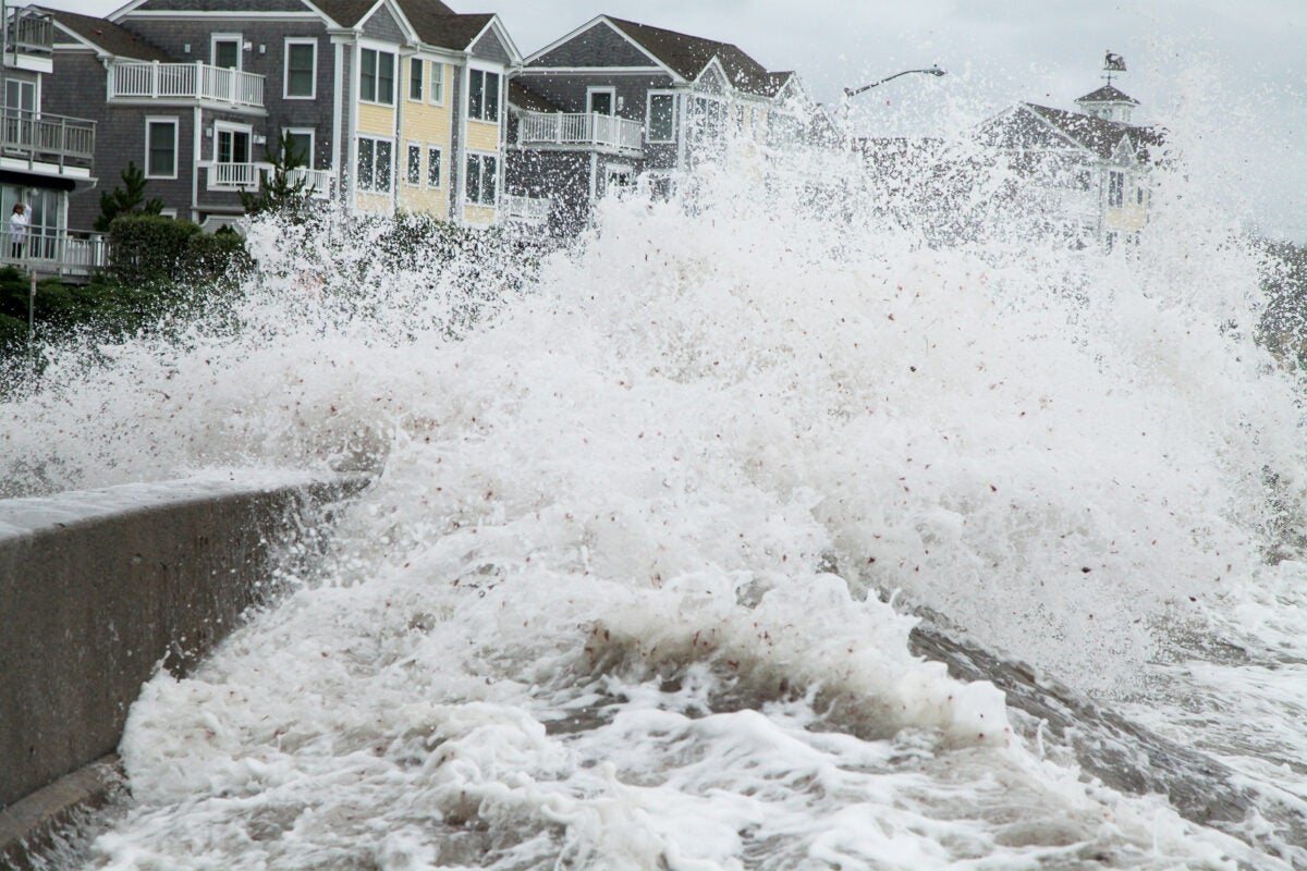 Storm surge hitting houses along coast.