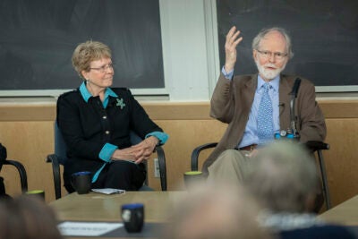 Jane Lubchenco (left) and Jim McCarthy discuss impact of climate change on Earth's oceans.