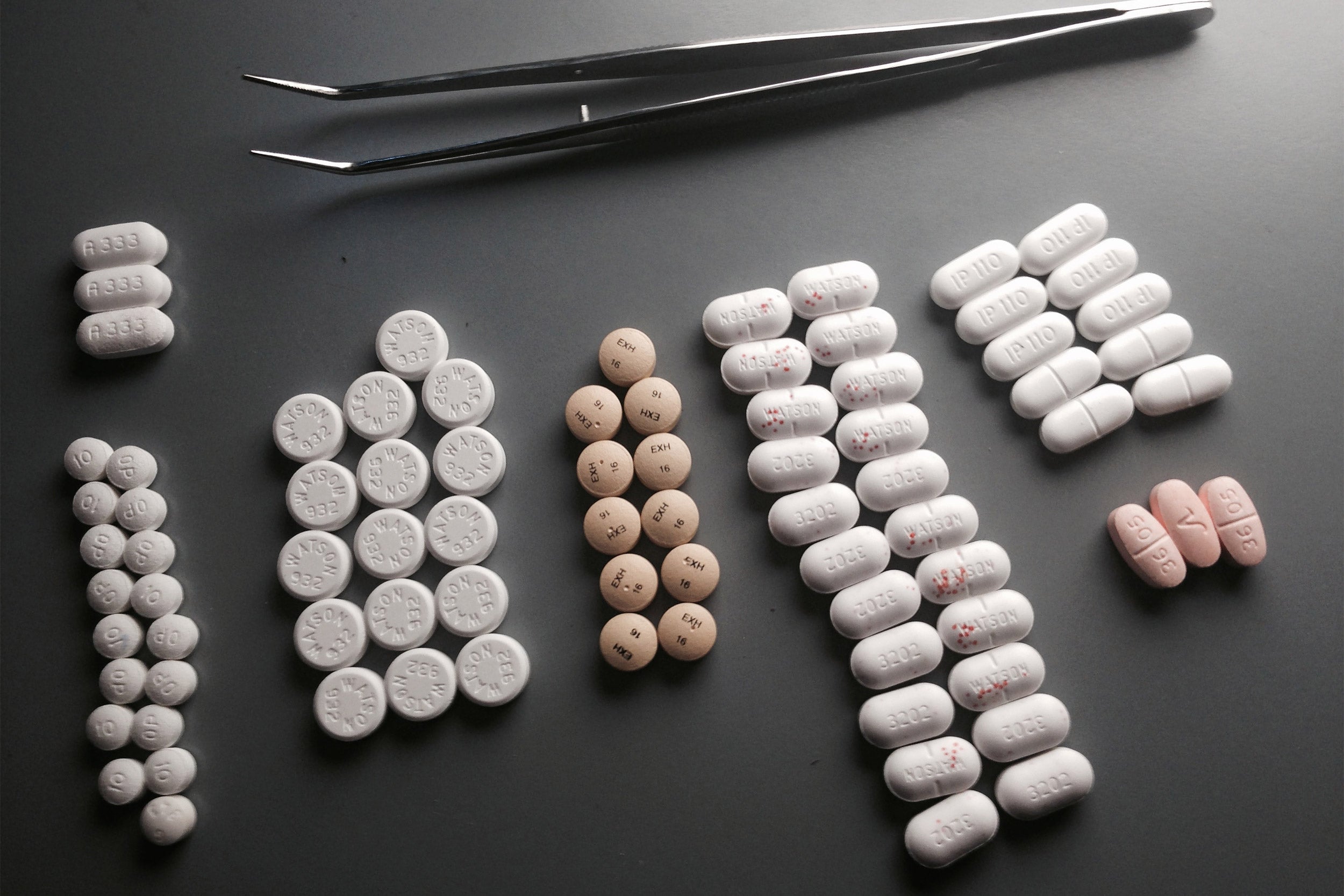 Pills laid out on a table.