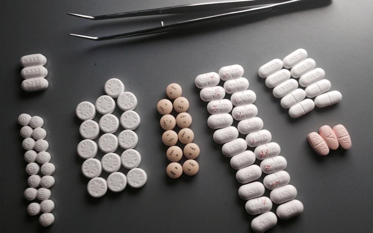 Pills laid out on a table.