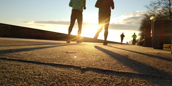 Two men running.