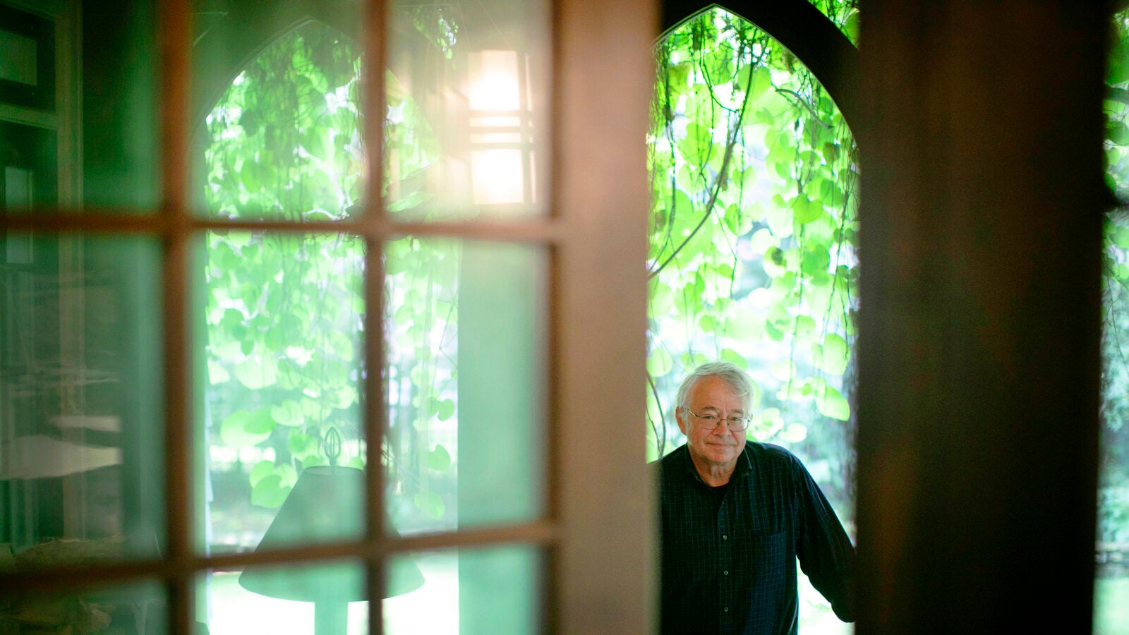 Stephen Coit, the artist of the Harvard Foundation Portraiture Project, is pictured in his Cambridge home.