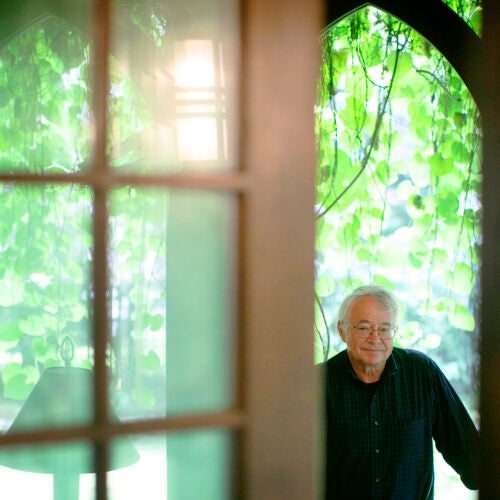 Stephen Coit, the artist of the Harvard Foundation Portraiture Project, is pictured in his Cambridge home.