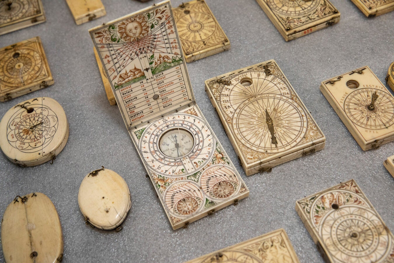 Picture of different kinds of ivory pocket sundials.