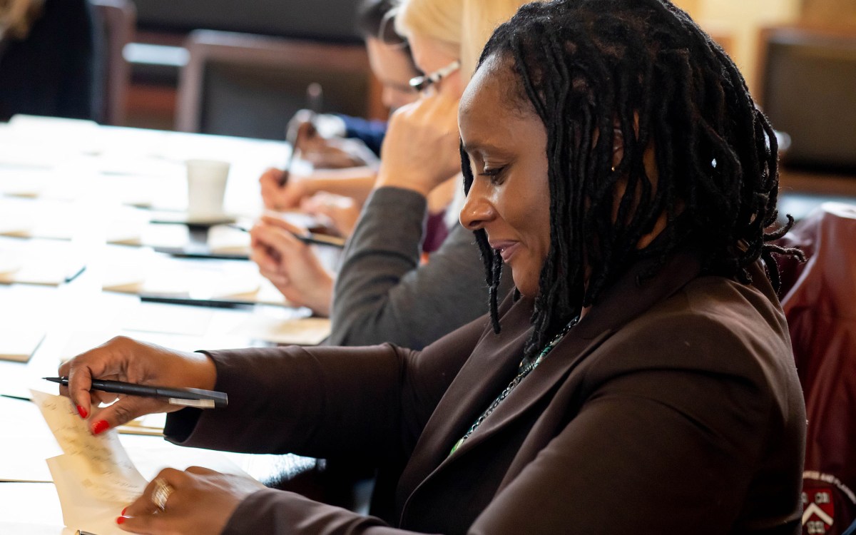 Woman writing thank-you note.