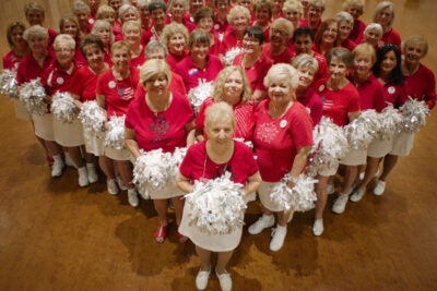 Group of cheerleaders from retirement community in scene from "Some Kind of Heaven."