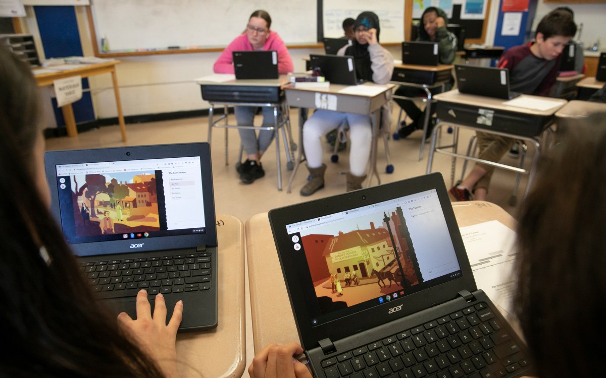 Students in classroom with computers.