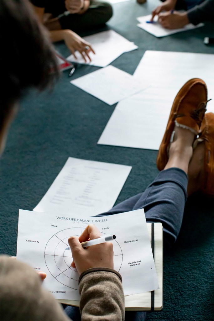 Student filling out worksheet.