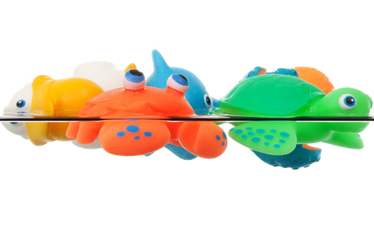 Plastic toys floating on water.
