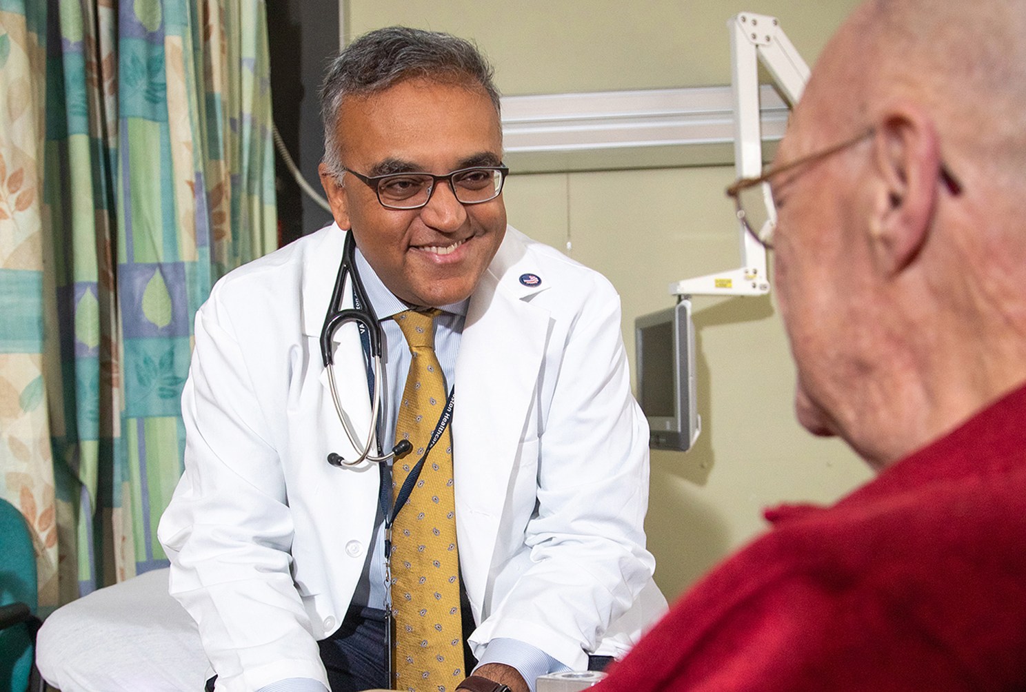 Doctor speaking to patient.