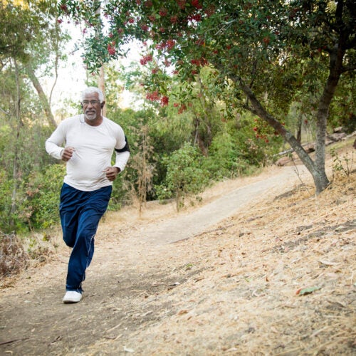 An older man jogging.