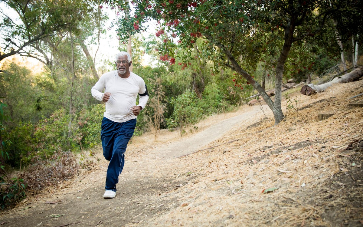 An older man jogging.